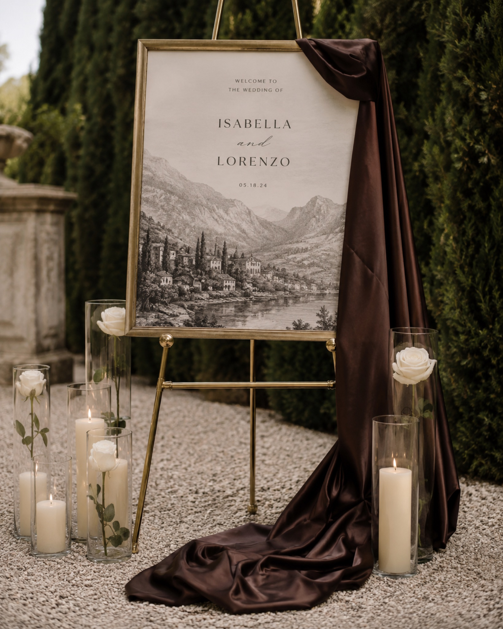 Illustrated wedding welcome sign on an easel with candles